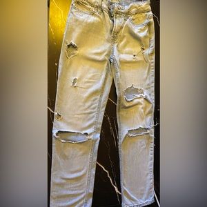 Light blue ripped jeans